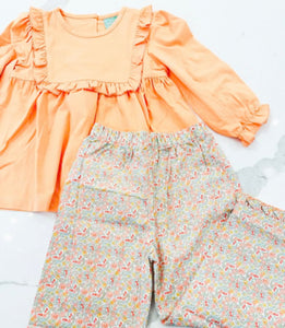 Orange Shirt with Floral Pants